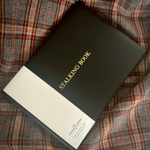 Black leather deer stalking record book