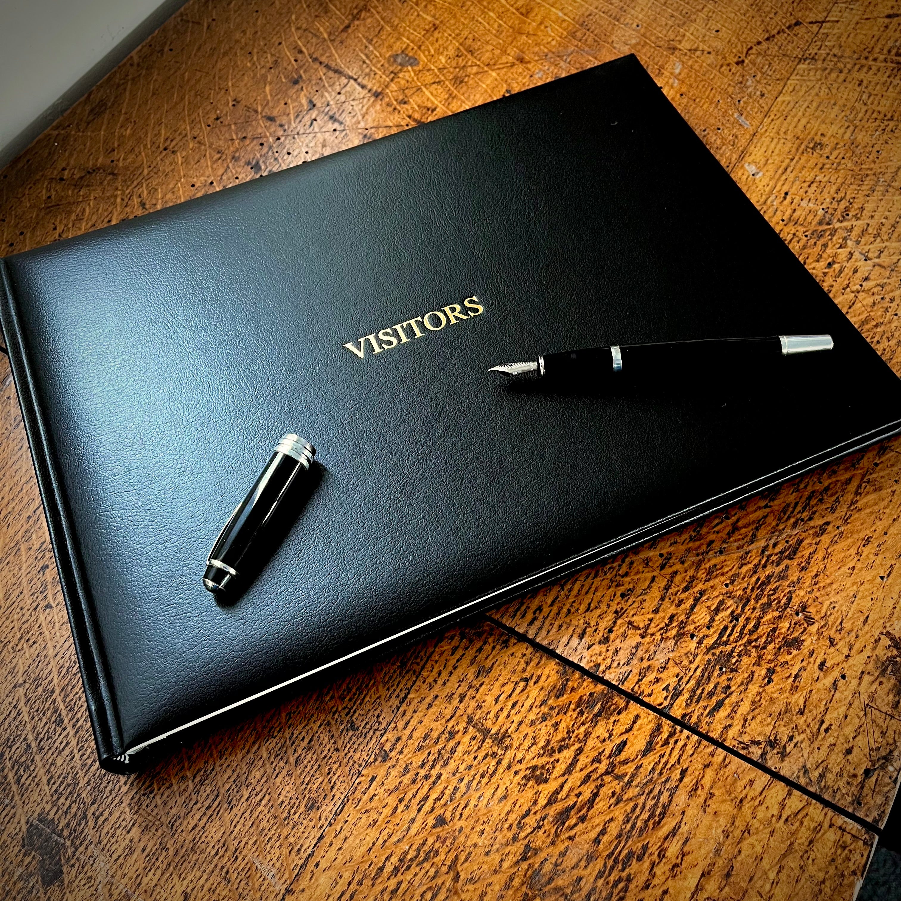 Black Leather Personalised Visitor Guest Book, Hand Bound in recycled leather