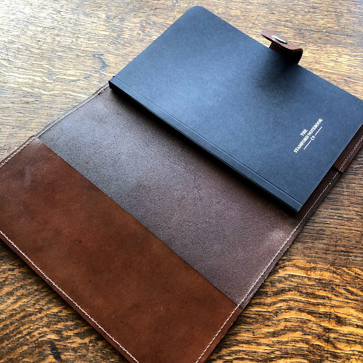 Open Burghley Leather Refillable Journal showing replaceable book
