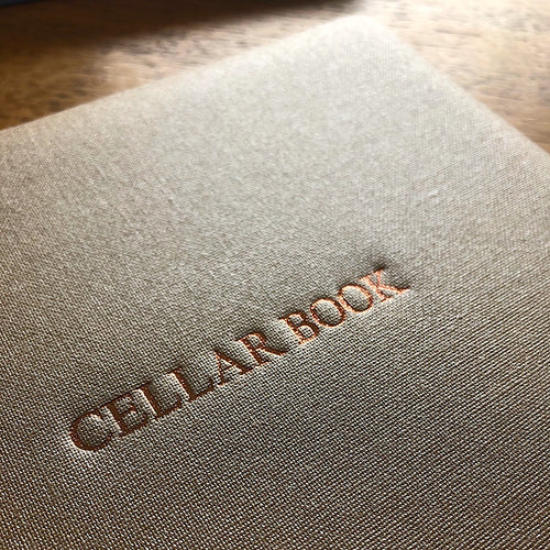 text image of Champagne Metallic Buckram Cellar Book