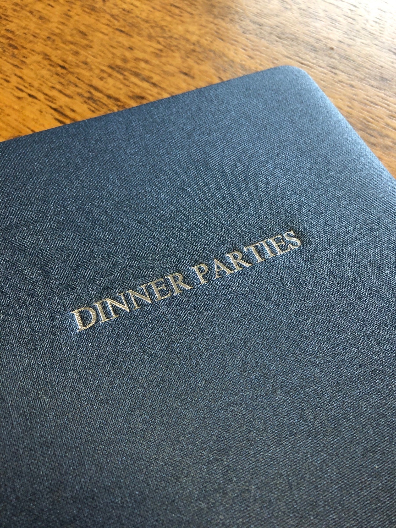 Text Image of Metallic Buckram Sapphire Dinner Party Book