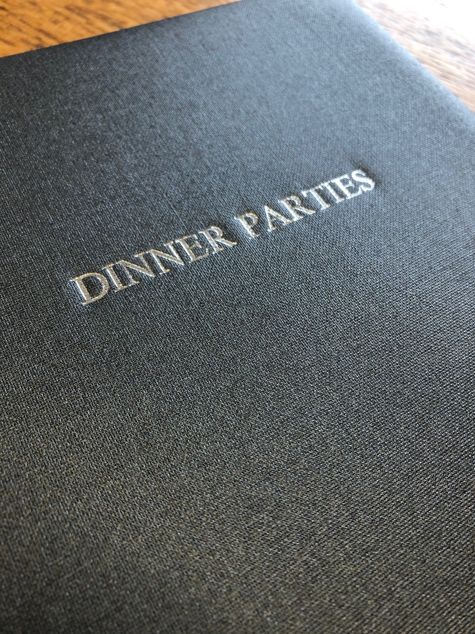 Text Image of Steel Grey Metallic Buckram Dinner Party Book